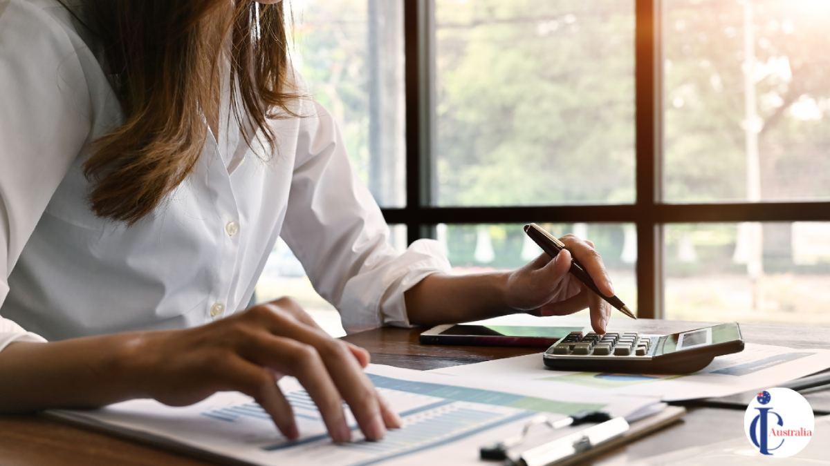 Woman analyzing financial reports in Australia